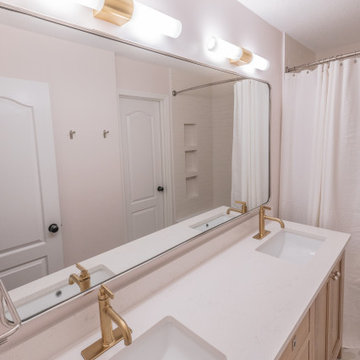 Playful Guest Bath Remodel with Fun Tile and Mixed Metals