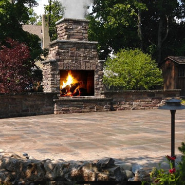 Metuchen, NJ. Stone Fireplace, Sitting Walls, Patio & Colorful Landscape