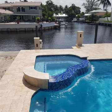 Pool with Partly Raised Spa and Bubbler with a Romantic Touch in Boca Raton Fl.
