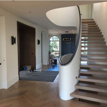 Curved Staircase at Entry