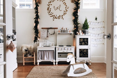 Inspiration for a mid-sized shabby-chic style girl medium tone wood floor and brown floor kids' room remodel in Vancouver with white walls
