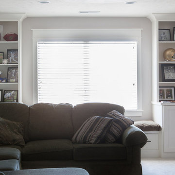 Built-ins with base cabinets and window bench seat