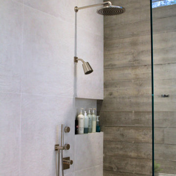 Open Shower Detail with Graphite Fixtures and Concrete Accent Wall