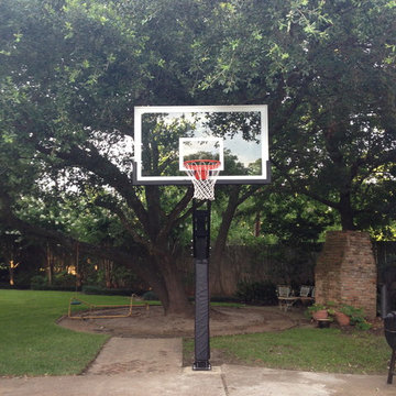 John F's Pro Dunk Platinum Basketball System on a 20x20 in Beaumont, TX