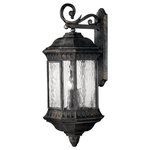 Hinkley Lighting - Hinkley Lighting Regal 4 Light Outdoor Large Wall Mount, Black Granite - 1726BG - Regal has a grand Old World style that features elegant decorative stamped detailing in a Black Granite finish combined with clear seedy water glass for added sophistication