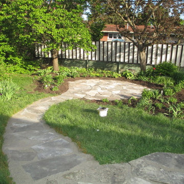 Crystal Beach - Flagstone Walkway, Patio & Transplanting Project