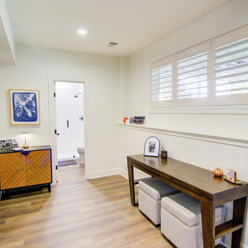 Warm & Inviting Basement Retreat with Kitchenette and Reading Nook