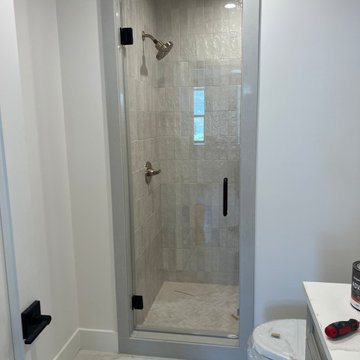 Frameless Glass Shower Door with Black Hardware