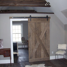 bedroom barndoor with beams