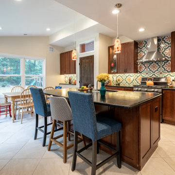 Cheerful Multi Level Rear Addition to Expand Kitchen, Mudroom & Sunroom in Oakt