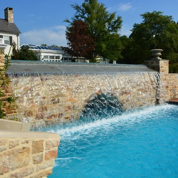Infinity edge pool with underground grotto