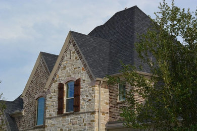 Inspiration for a timeless stone exterior home remodel in Houston