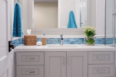 Bathroom - mid-sized coastal bathroom idea in Los Angeles with quartz countertops