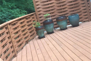 Deck - craftsman backyard deck idea in Raleigh with no cover