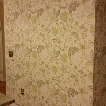 Updated kitchen with wallpaper and backsplash