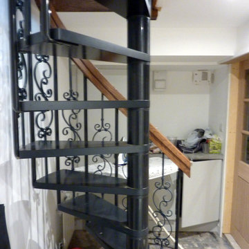 Humphrey Munsen Style Kitchen with Spiral Stairs