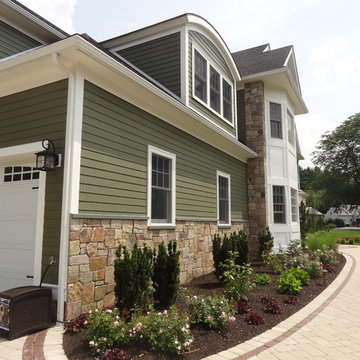 Combining Colonial Tan Natural Stone with Olive Green Siding