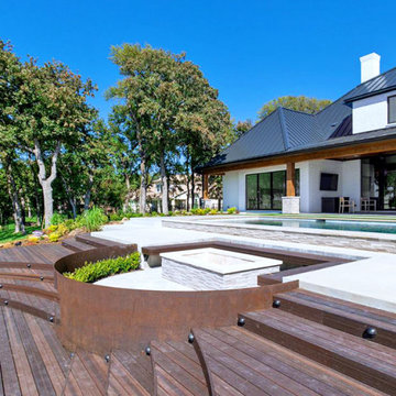Waterfront deck with pool featuring Rustic Walnut composite decking