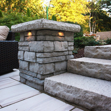 Unilock's Rivercrest pillar, Ledgestone steps, & porcelain tile