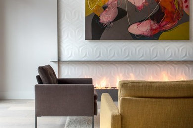 Contemporary living room in Atlanta with a ribbon fireplace and a tile fireplace surround.