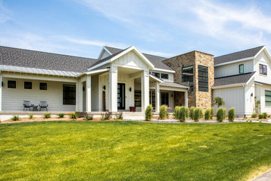 Inspiration for a farmhouse white house exterior remodel in Salt Lake City