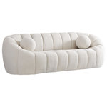 Meridian Furniture - Elijah Boucle Fabric Upholstered Sofa, Cream - Sit back and relax in casual style when you bring home this Elijah boucle fabric sofa. Inspired by the unmistakably relaxed vibe created by a classic bean bag, this inviting sofa features a rounded design with deep channel tufting for added support and resilience. It comes with an accent pillow for even more welcoming comfort, and the sofa is upholstered all over with rich cream boucle fabric that beckons you to sit, rest, and take it easy.