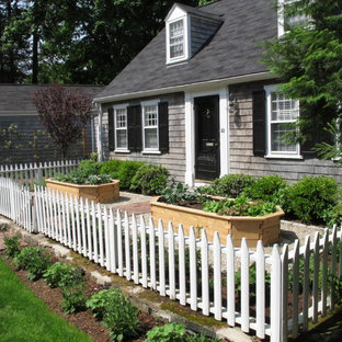 Inspiration for a small traditional front yard full sun garden for summer in Boston with a vegetable garden and brick pavers.