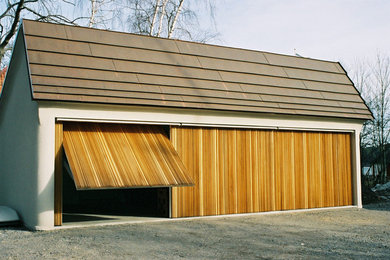 Photo of a mid-sized transitional detached garage in Stockholm.