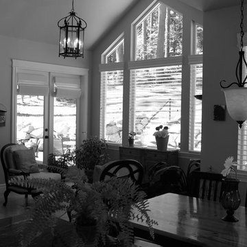 Garden Room Featuring Wood Blinds Coupled With Roman Shades