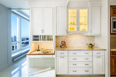 Example of a mid-century modern kitchen design in Milwaukee