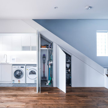 Understairs Laundry room with bi-fold doors