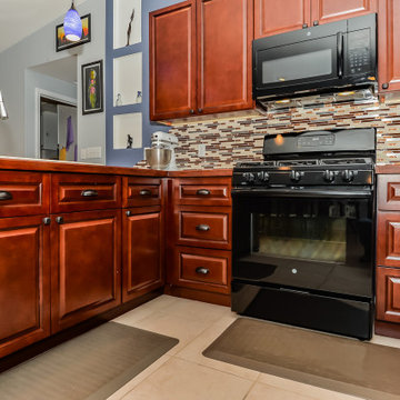 Cherry Raised Panel Kitchen Cabinets