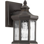 Progress Lighting - Edition 1-Light Wall Lantern, Small - The one-light small wall lantern in the Edition collection features distinctive hexagonal shape for classic styling. Clear water glass elements are accented by a Antique Bronze finish. Die-cast aluminum construction with a powder coat finish makes this a durable style for updating a home's curb appeal.