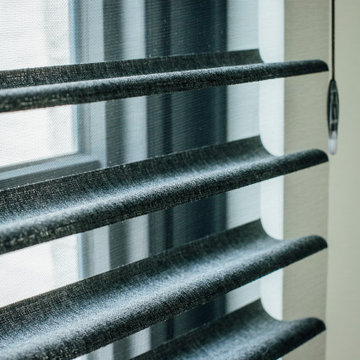 Functional Drapes with 2-Finger Pinch Pleat on a Matte Black Traverse Rod