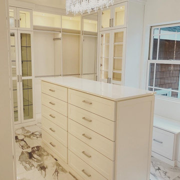 White Custom Walk-in Closet With Marble Floors