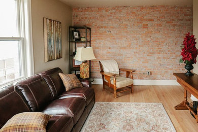 Inspiration for a mid-sized timeless formal and open concept light wood floor living room remodel in Other with yellow walls, no fireplace and no tv