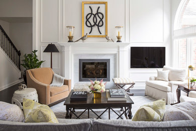 Design ideas for a transitional formal open concept living room in Minneapolis with white walls, a standard fireplace, a wall-mounted tv and a stone fireplace surround.