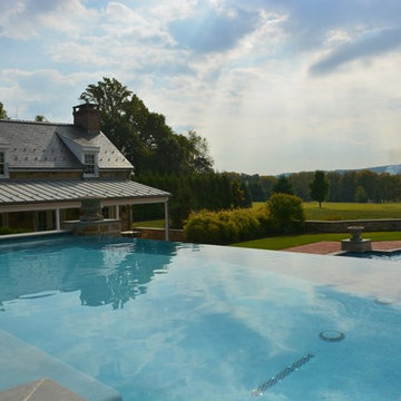 Infinity edge pool with underground grotto