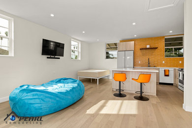Example of a mid-sized trendy laminate floor living room design in Los Angeles