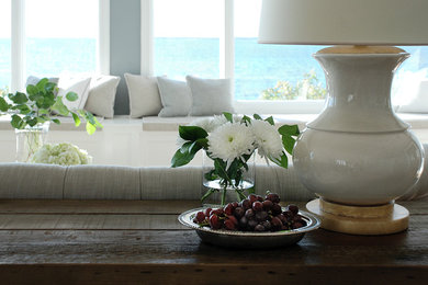 Inspiration for a large coastal formal and open concept medium tone wood floor living room remodel in Bridgeport with gray walls, no fireplace and no tv