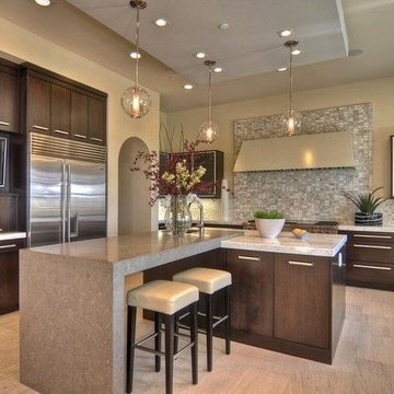 Contemporary Kitchen with Large Stainless Refrigerator