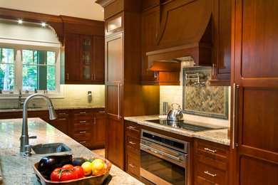 Inspiration for a large timeless l-shaped light wood floor eat-in kitchen remodel in Other with a single-bowl sink, recessed-panel cabinets, medium tone wood cabinets, stainless steel appliances and an island