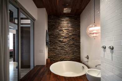 Bathroom - industrial bathroom idea in New York