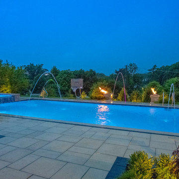 Burr Ridge Lap Pool with Raised Hot Tub and Waterfall