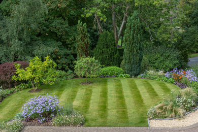 Photo of a medium sized classic garden in Hertfordshire.