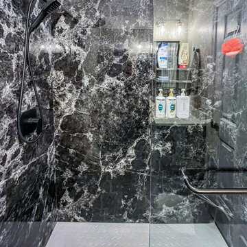 Guest Bathroom with Onyx Cabinets and Tyvarian shower