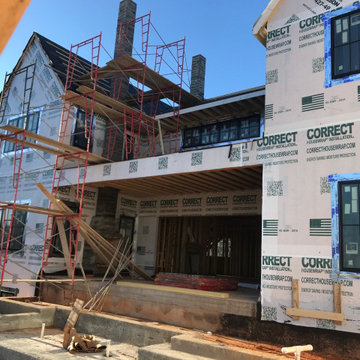 PROGRESS PHOTO: Rear elevation with outdoor room, roof deck, pool