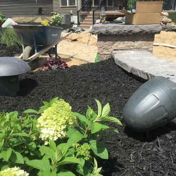 Pondless Waterfall, Patio, Firepit, Outdoor Audio, Plantings, and Lighting