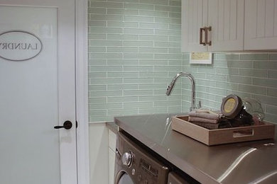 Laundry room - contemporary laundry room idea in Austin