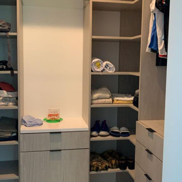 Efficient Organization: Small Gray Walk-in Closet Solutions
